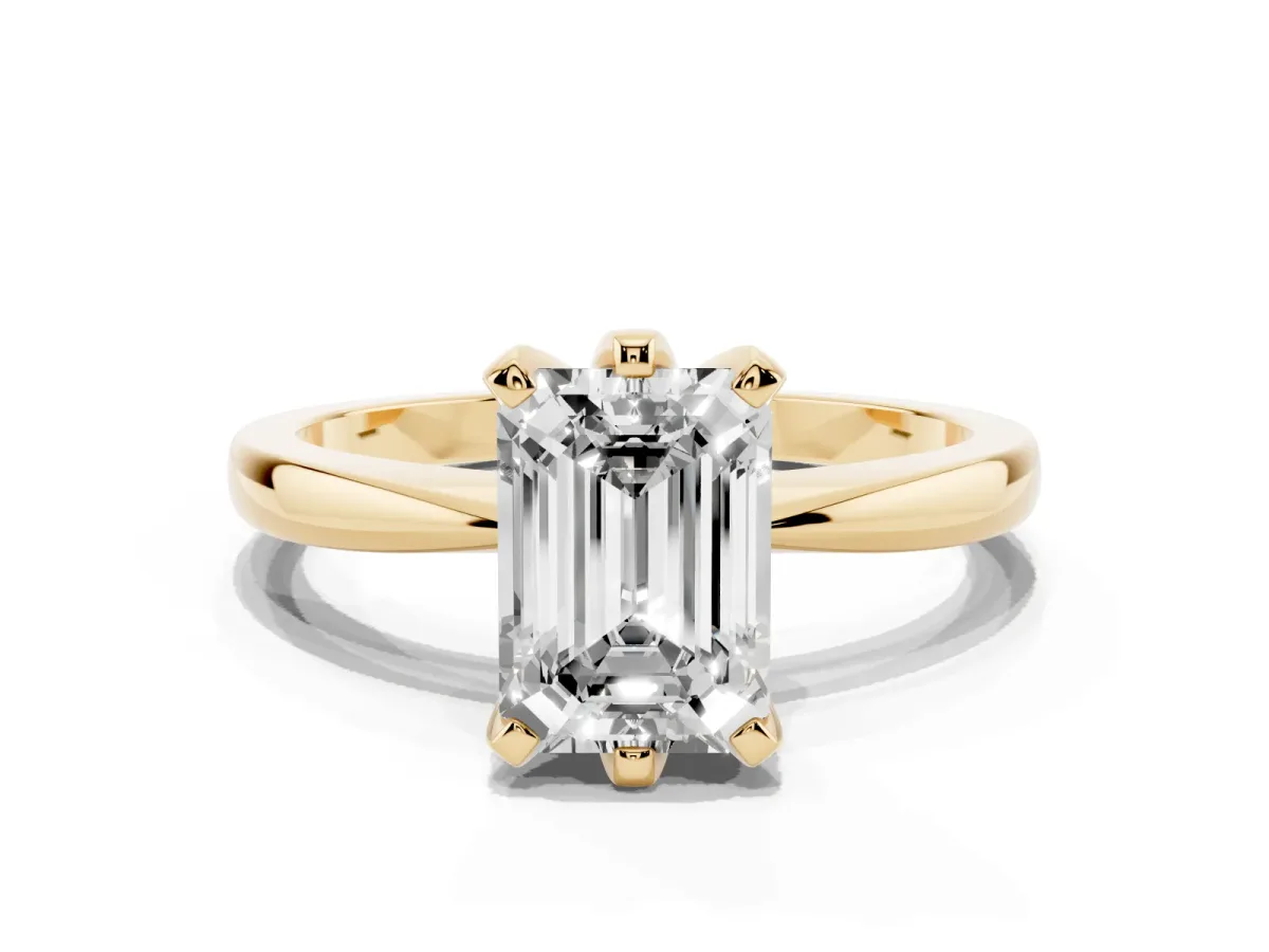 Emerald Cut Solitaire Engagement Ring with Six-Prong Setting and Tapered Band Yellow gold