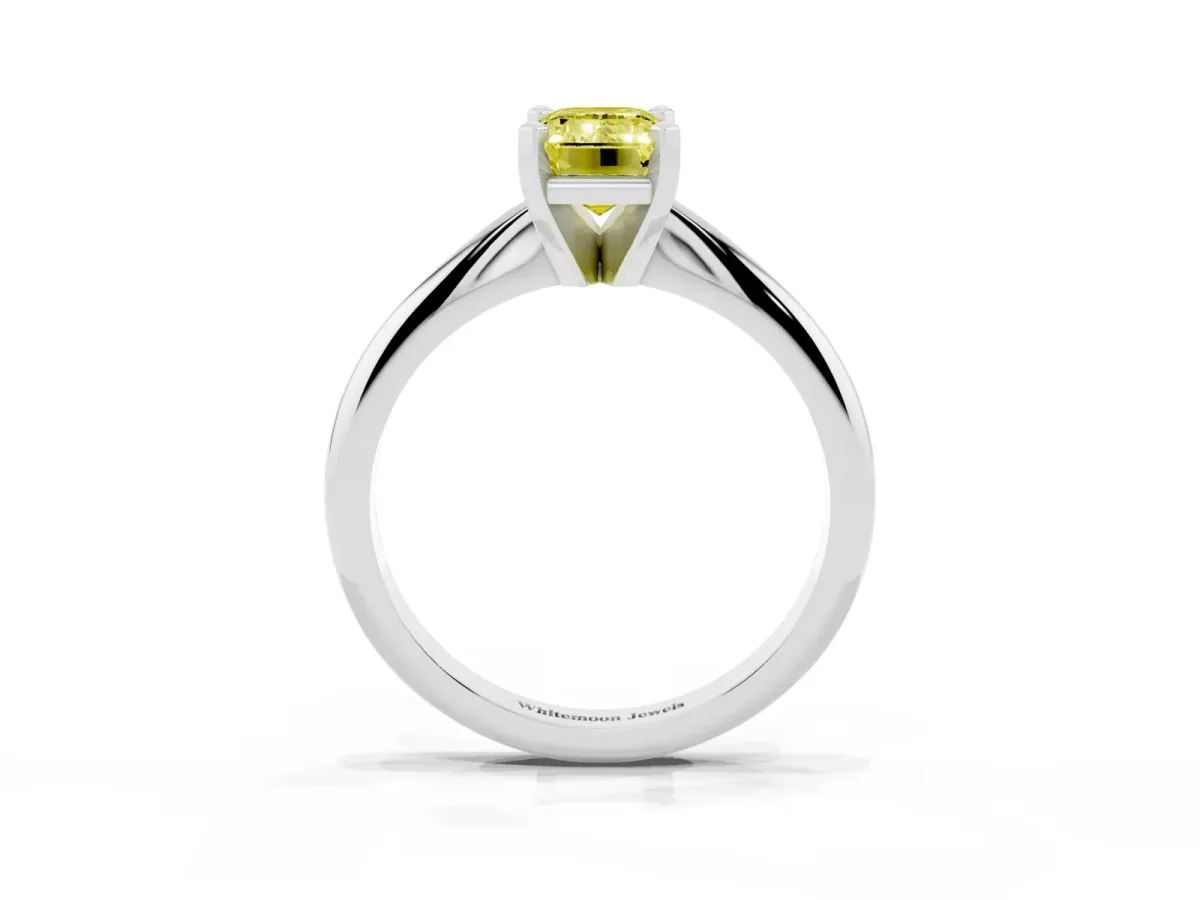 Fancy Yellow Emerald Cut Cut Solitaire Ring with Four-Prong Setting on a Classic Band Silver