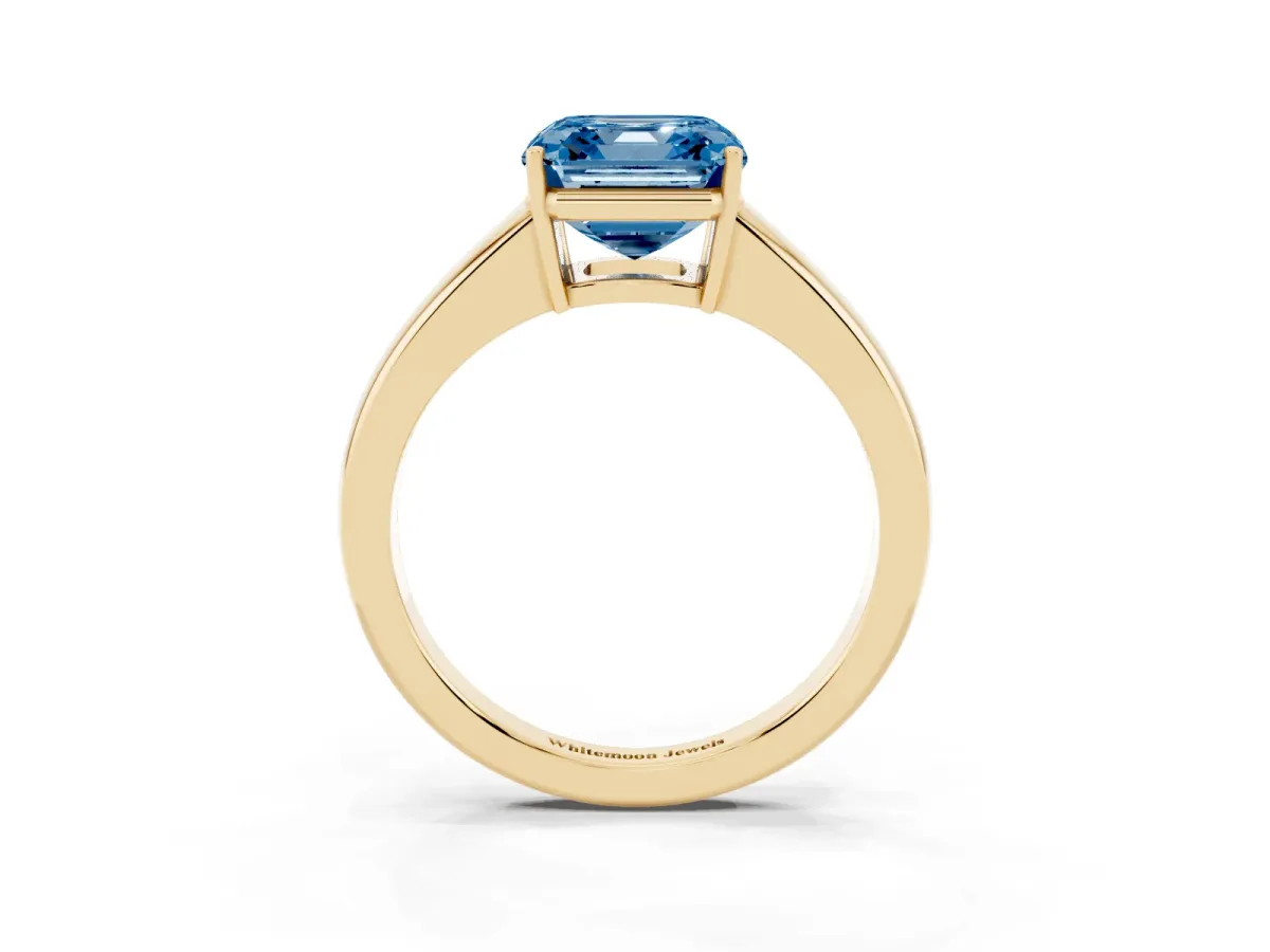 Fancy Blue Asscher Cut Solitaire Diamond Ring with Tapered Band and Four-Prong Setting Yellow gold