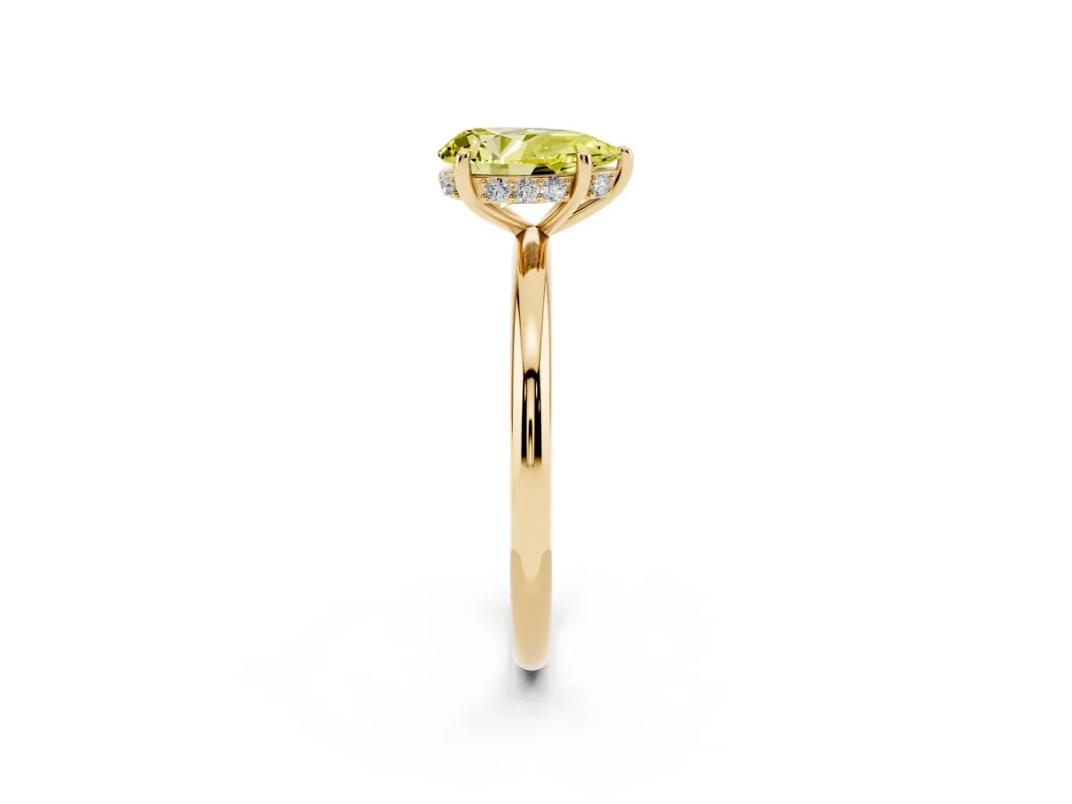 Fancy Yellow Pear Cut Solitaire Diamond Ring with a Classic Band and Four-Prong Setting Yellow gold