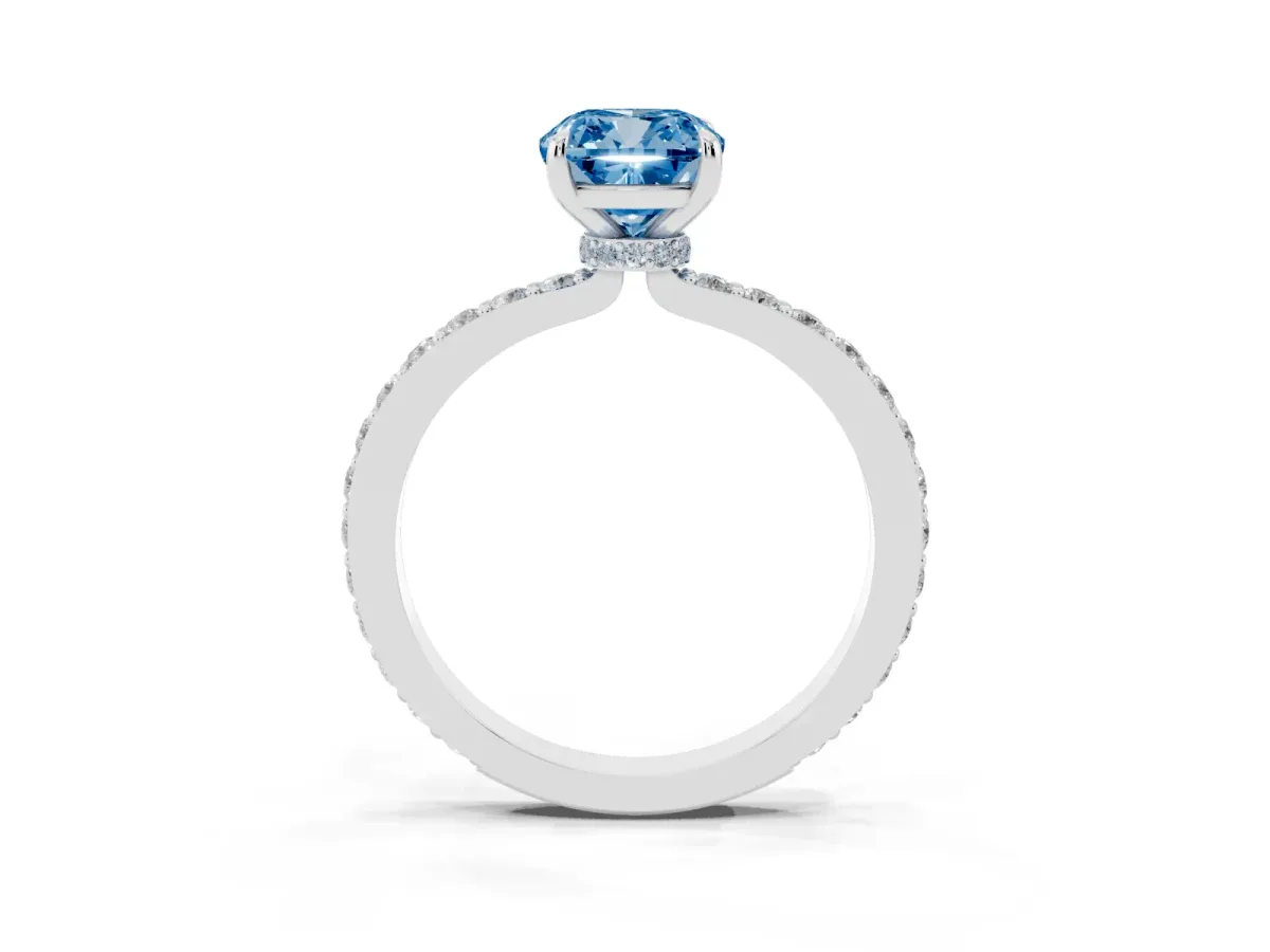 Fancy Blue Cushion Cut Diamond Solitaire Engagement Ring with Pavé Band and Four-Prong Setting Silver