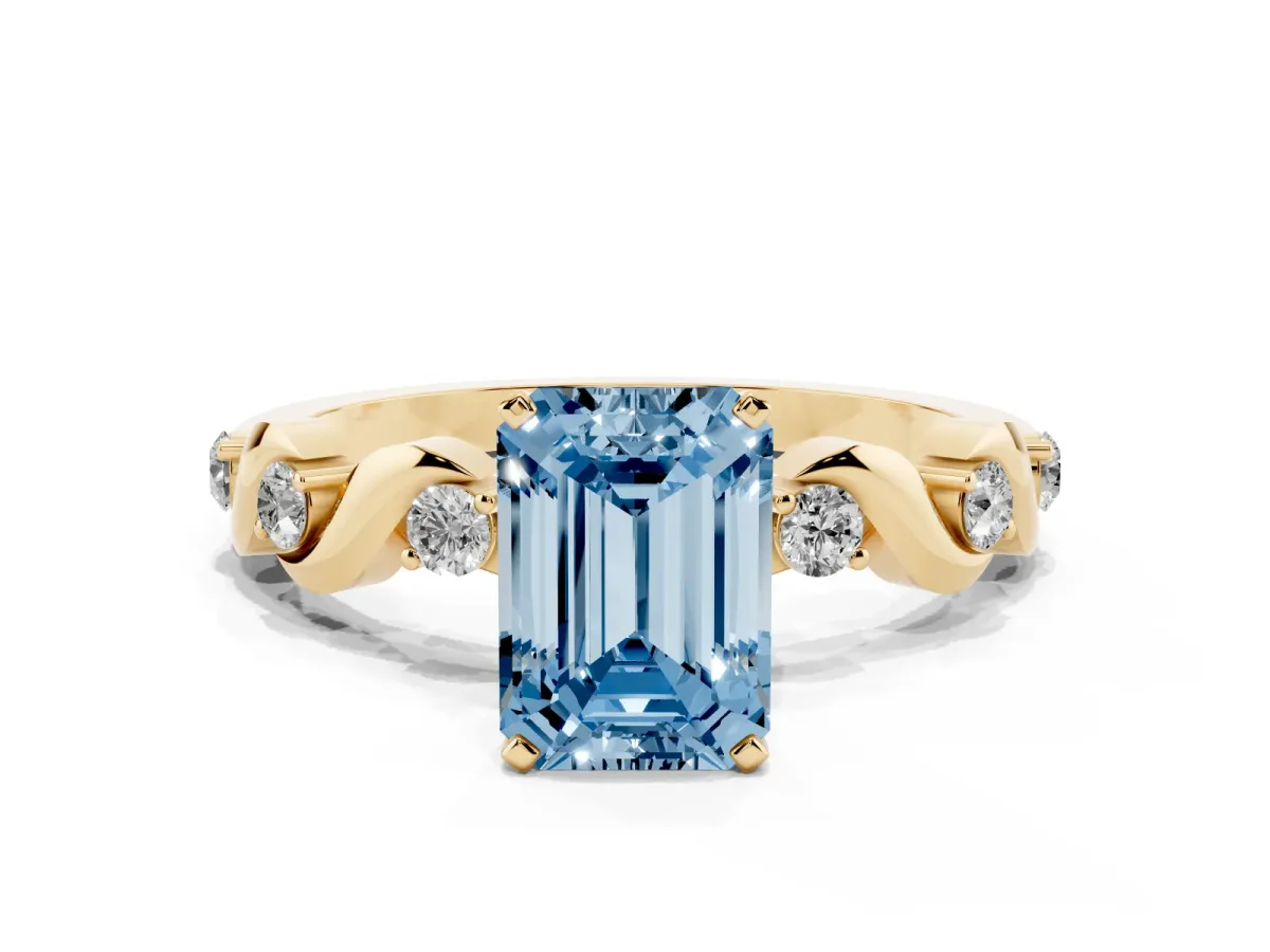 Fancy Blue Emerald Cut Diamond Solitaire Twisted Band with Round Accents and Prong Setting Yellow gold