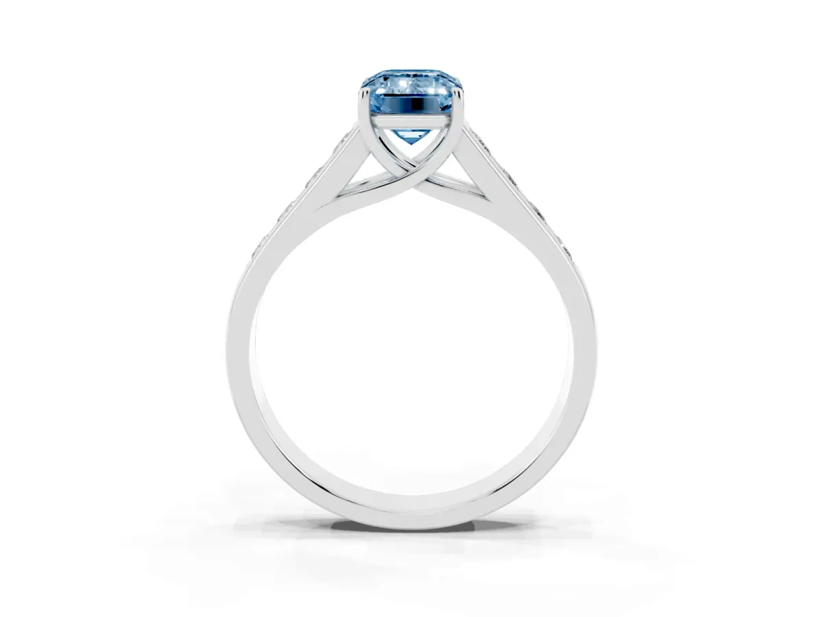 Fancy Blue Emerald Cut Brilliant Channel-Set Solitaire Ring with Four-Prong Setting Platinum
