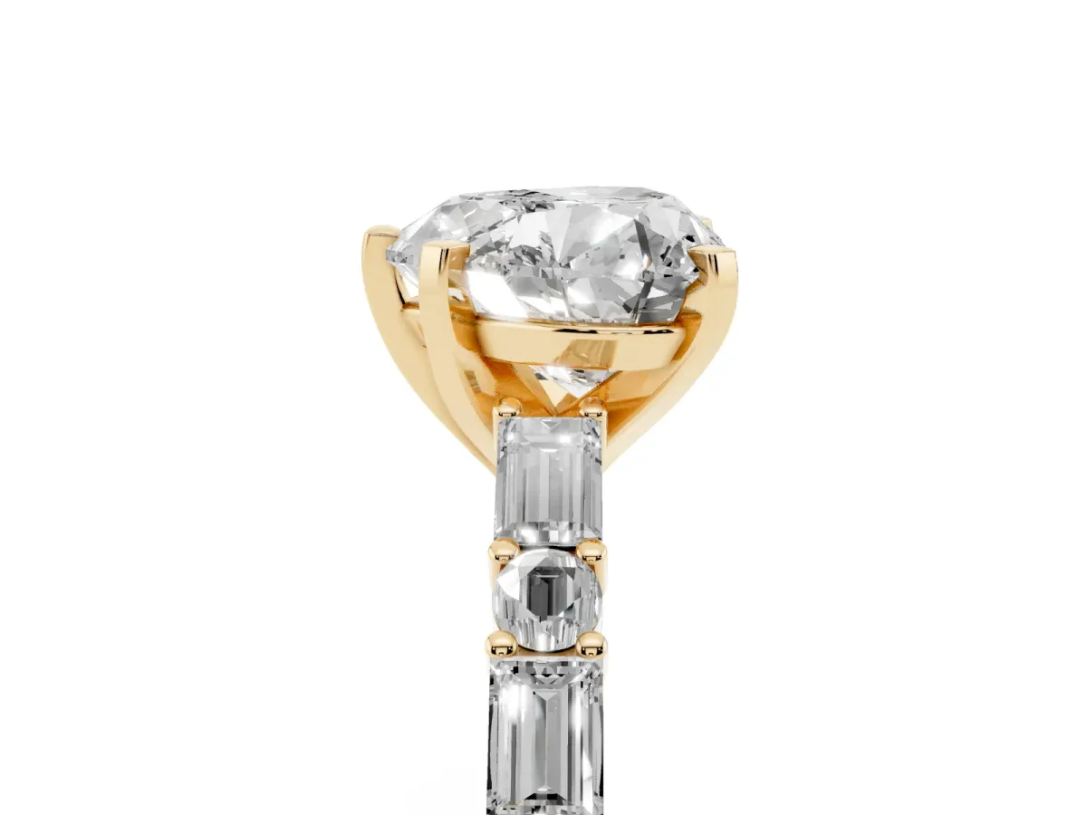 Heart Cut Diamond Solitaire with Side Baguettes and Channel Set Band Yellow gold