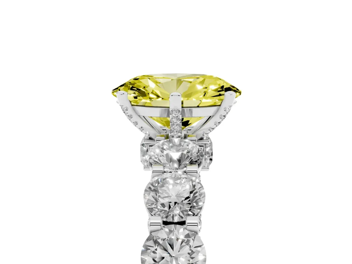 Fancy Yellow Oval Cut Diamond Side Stone Engagement Ring with Four-Prong Setting Platinum