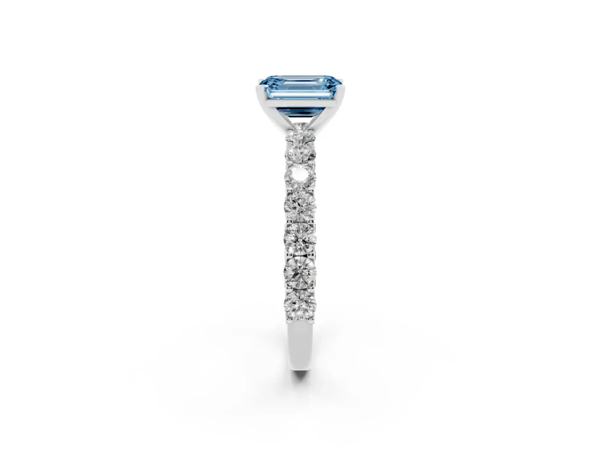 Fancy Blue Emerald Cut Diamond Solitaire Ring with Shared Prong Pavé Band and Four-Prong Setting Silver