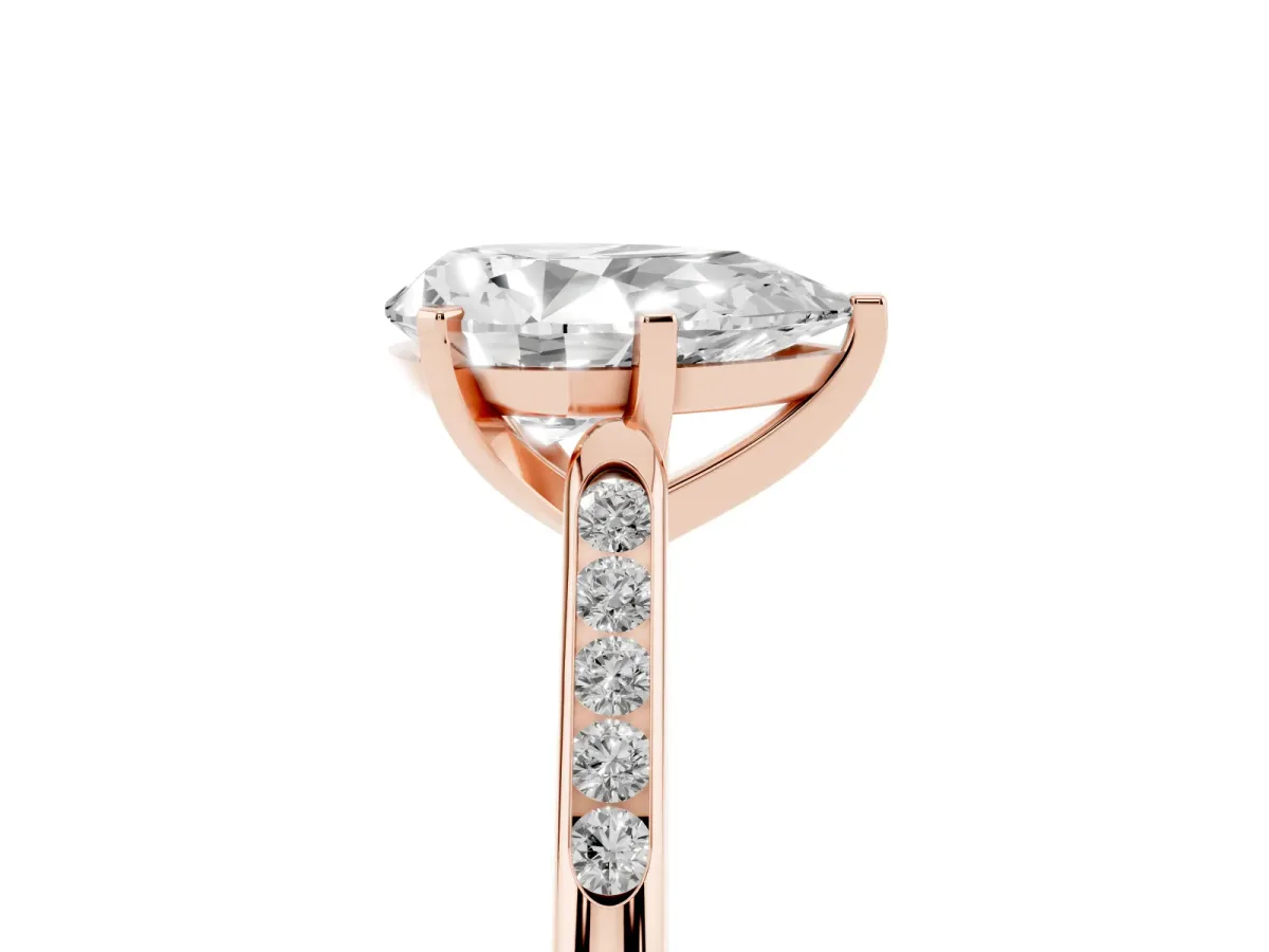 Pear Cut Diamond Solitaire Ring with Channel Set Round Band and Prong Setting Rose gold