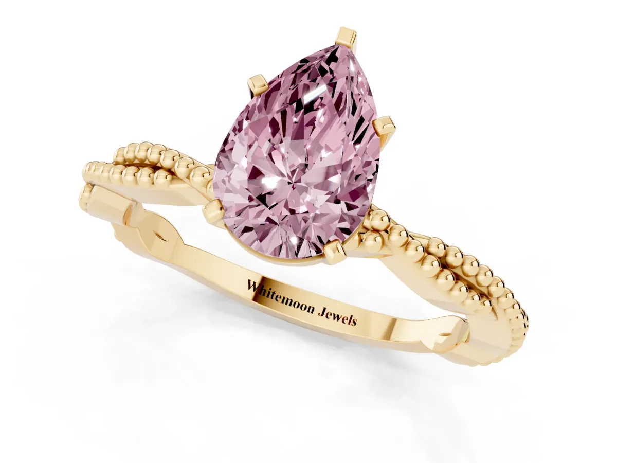 Fancy Pink Pear Cut Solitaire Twisted Band with Bead Prong Setting Yellow gold