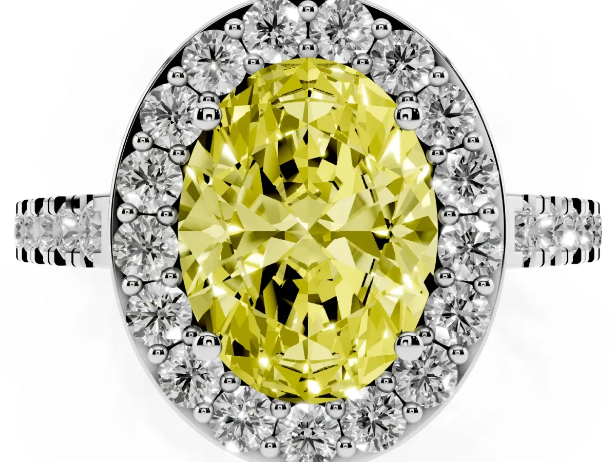 Fancy Yellow Oval Cut Diamond Halo Ring with Round Pavé Split Shank and Prong Setting Silver
