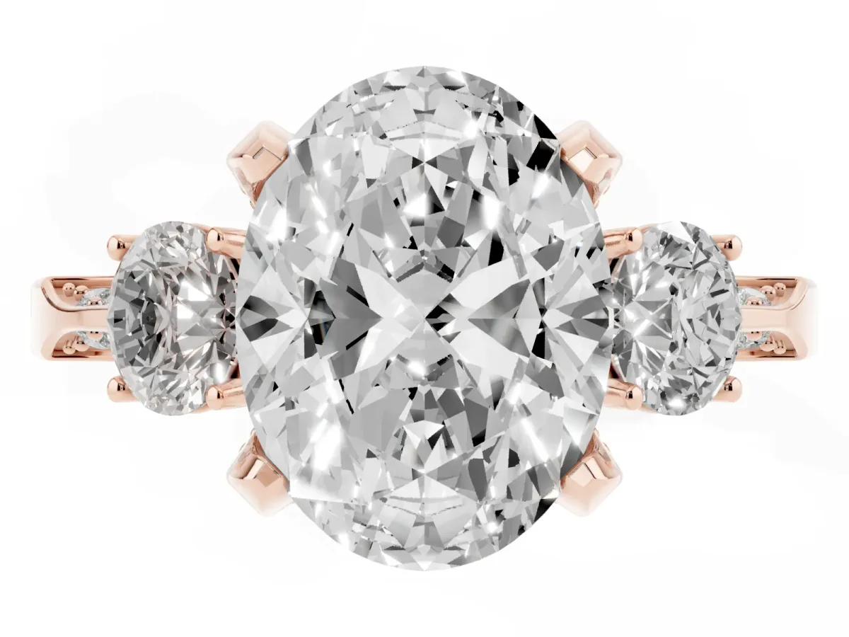 Oval Cut Brilliant Three-Stone Diamond Ring with Pavé Band and Four-Prong Setting Rose gold