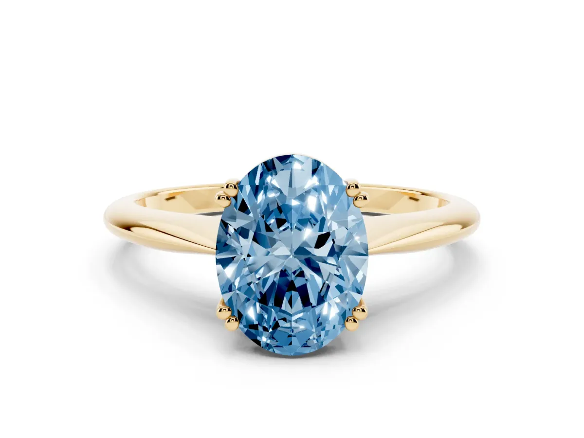 Fancy Blue Oval Cut Solitaire Diamond Ring with Six-Prong Setting and Classic Band Yellow gold