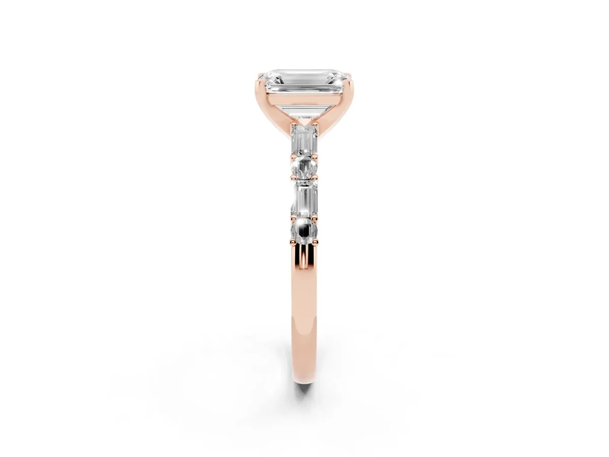 Emerald Cut Diamond Solitaire with Side Baguettes and Channel Set Band Rose gold