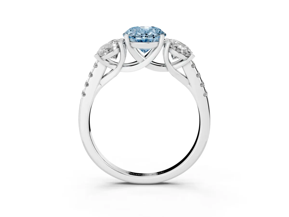 Fancy Blue Three-Stone Oval Cut Diamond Ring with Round Pavé Band and Prong Setting Silver