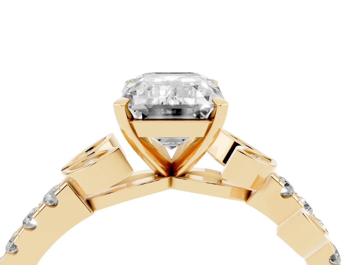 Emerald Cut Solitaire Leaf-Inspired Diamond Ring with Pavé Band and Four-Prong Setting Yellow gold