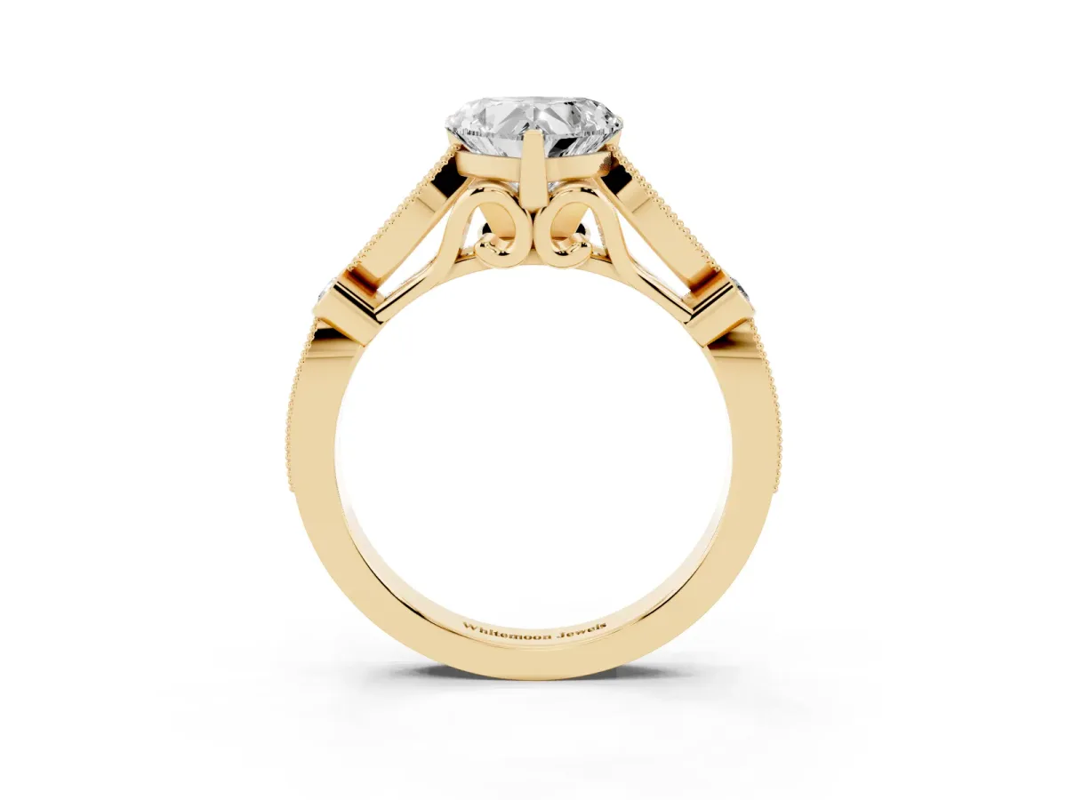 Heart Cut Cut Diamond with Milgrain Marquise and Bezel Accents on a Solitaire Band with Prong Setting Yellow gold