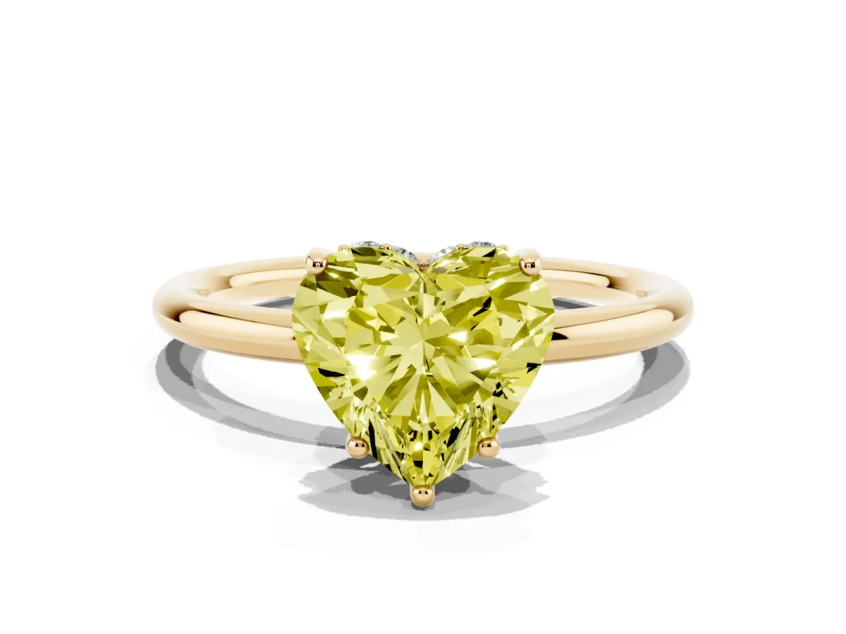 Fancy Yellow Heart Cut Solitaire Diamond Ring with a Classic Band and Four-Prong Setting Yellow gold