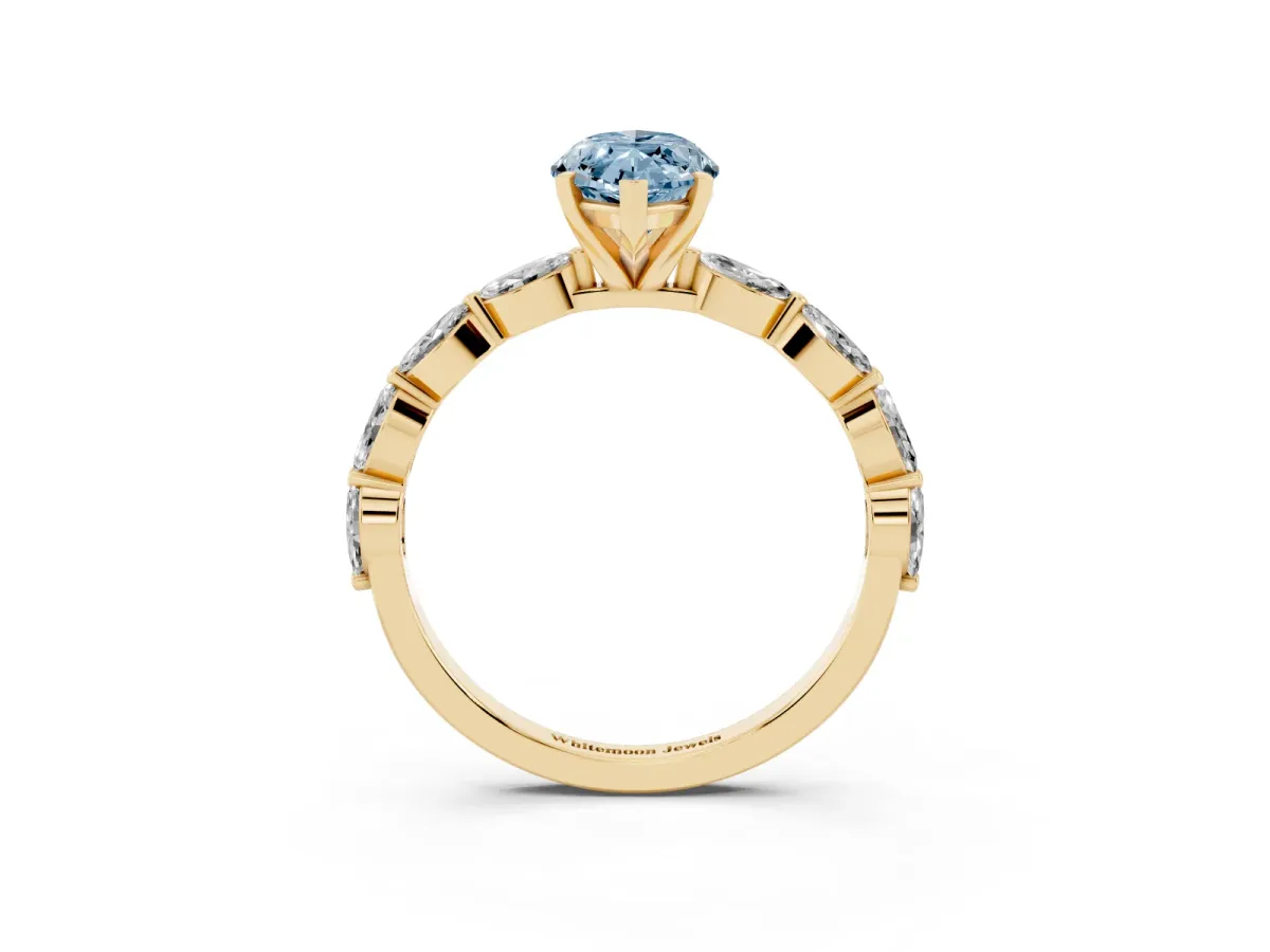 Fancy Blue Marquise Cut Diamond Ring with Marquise Side Stones and Prong Setting Yellow gold
