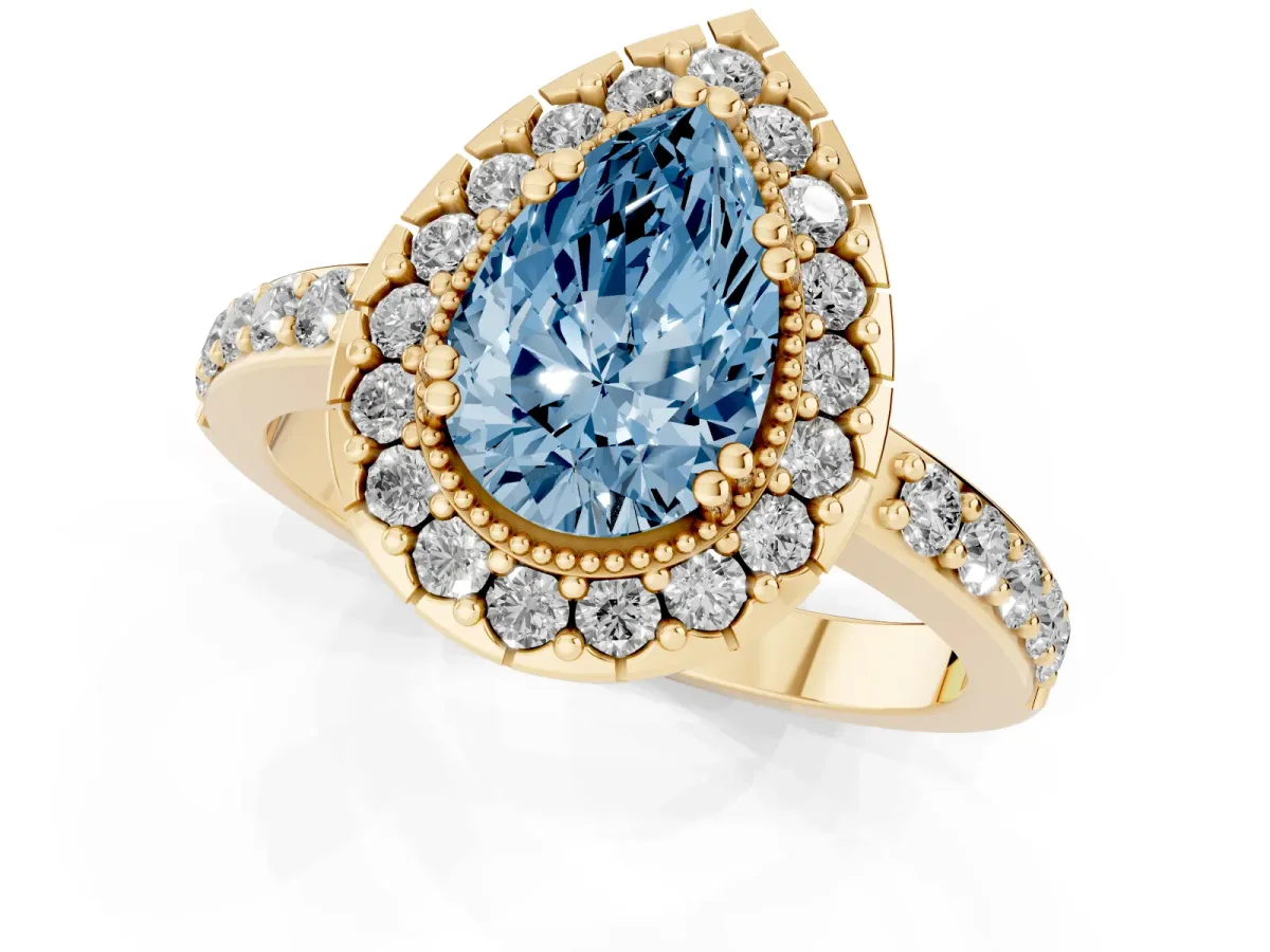 Fancy Blue Pear Cut Diamond Halo Ring with Pavé Band and Prong Setting Yellow gold