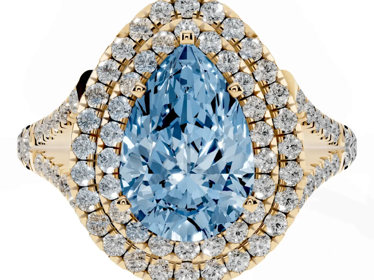 Fancy Blue Pear Cut Diamond Double Halo Ring with Split Shank and Prong Setting Yellow gold