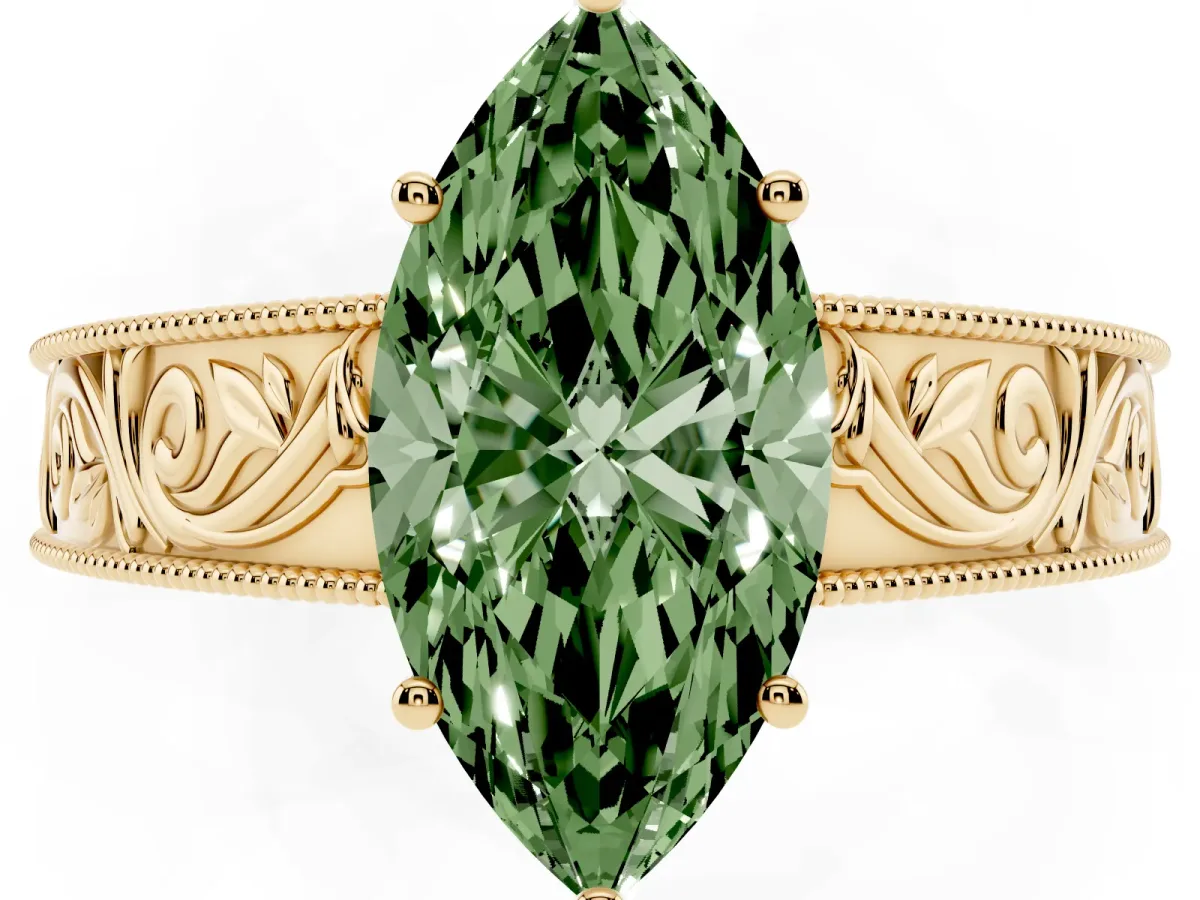 Fancy Green Marquise Cut Diamond Solitaire Ring with Engraved Band and Four-Prong Setting Yellow gold