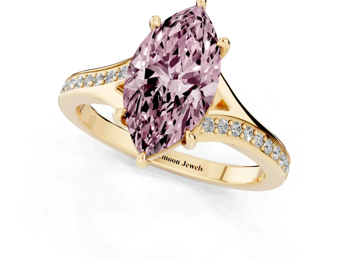 Fancy Pink Marquise Cut Diamond Solitaire Ring with Pavé Band and Prong Setting Yellow gold