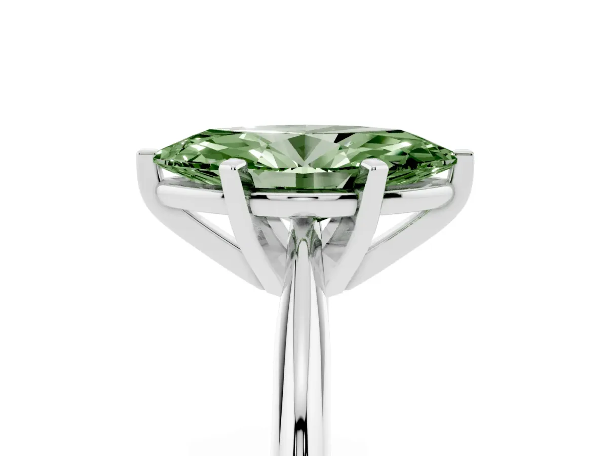 Fancy Green Marquise Cut Cut Solitaire Ring with Four-Prong Setting on a Classic Band Silver
