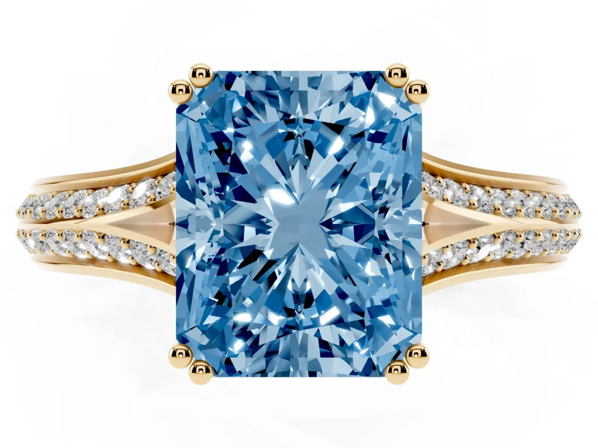 Fancy Blue Radiant Cut Diamond Split Shank Engagement Ring with Pavé Band Yellow gold