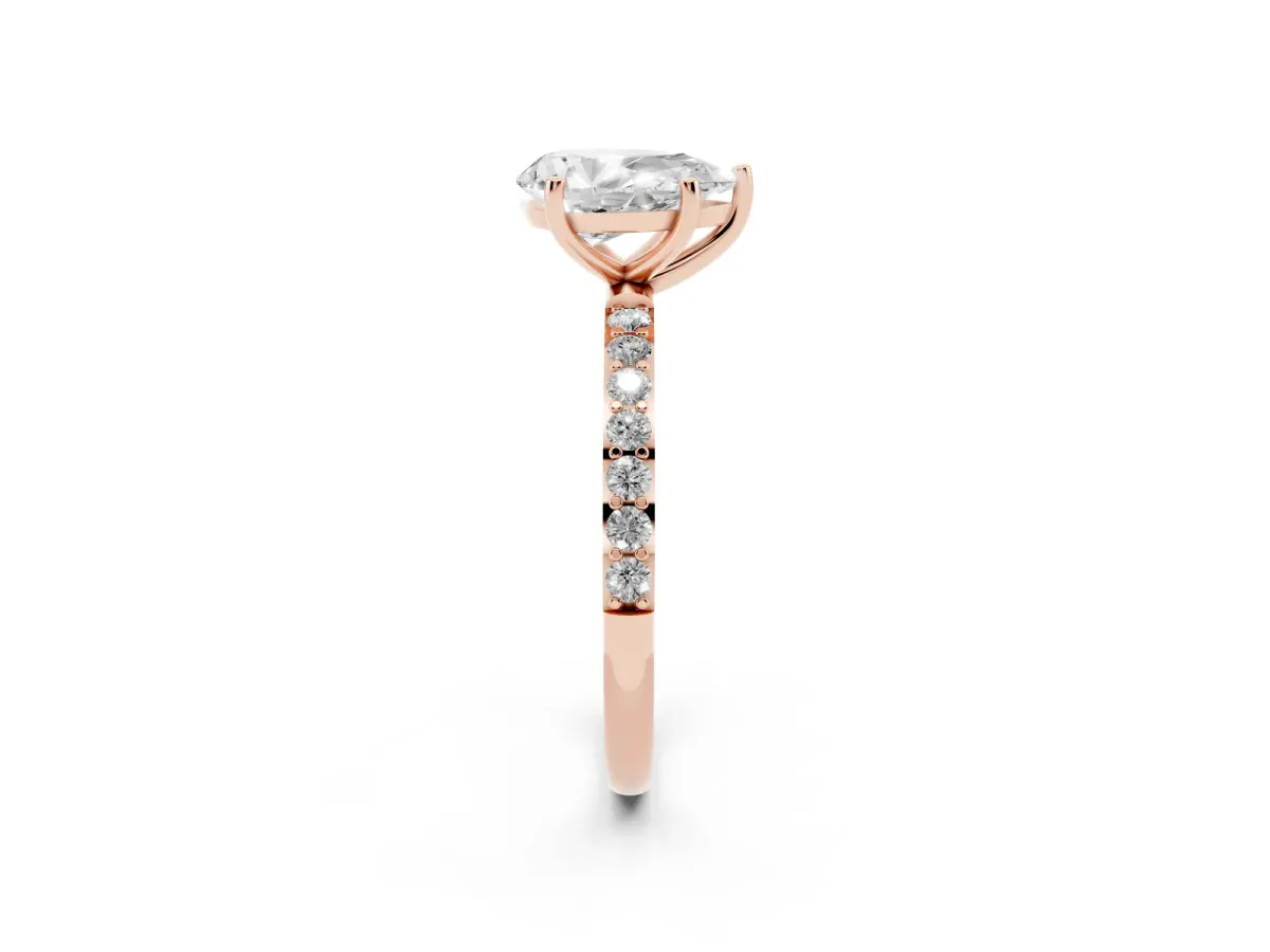 Pear Cut Diamond Solitaire Ring with Round Pavé Shoulders and Prong Setting Rose gold