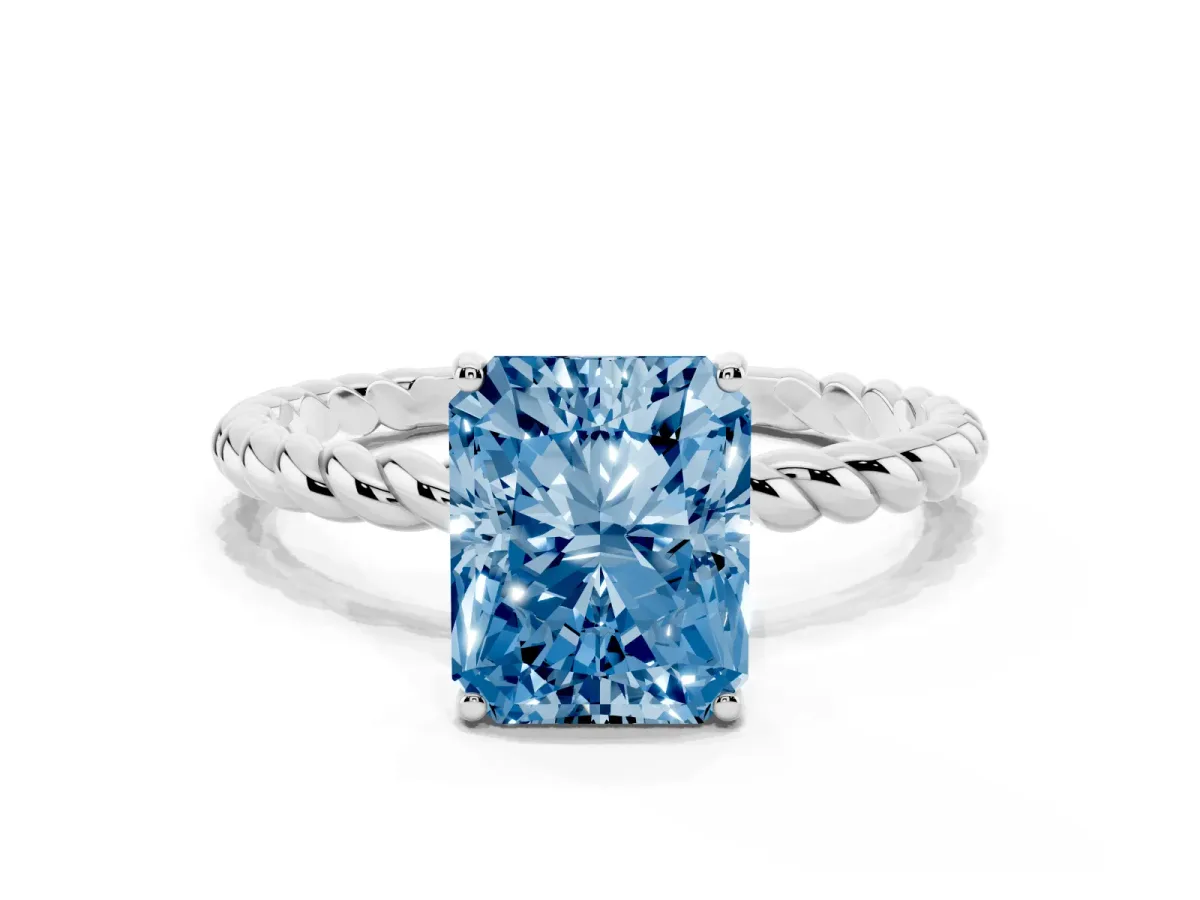 Fancy Blue Radiant Cut Solitaire Twist Band Ring with Four-Prong Setting Silver