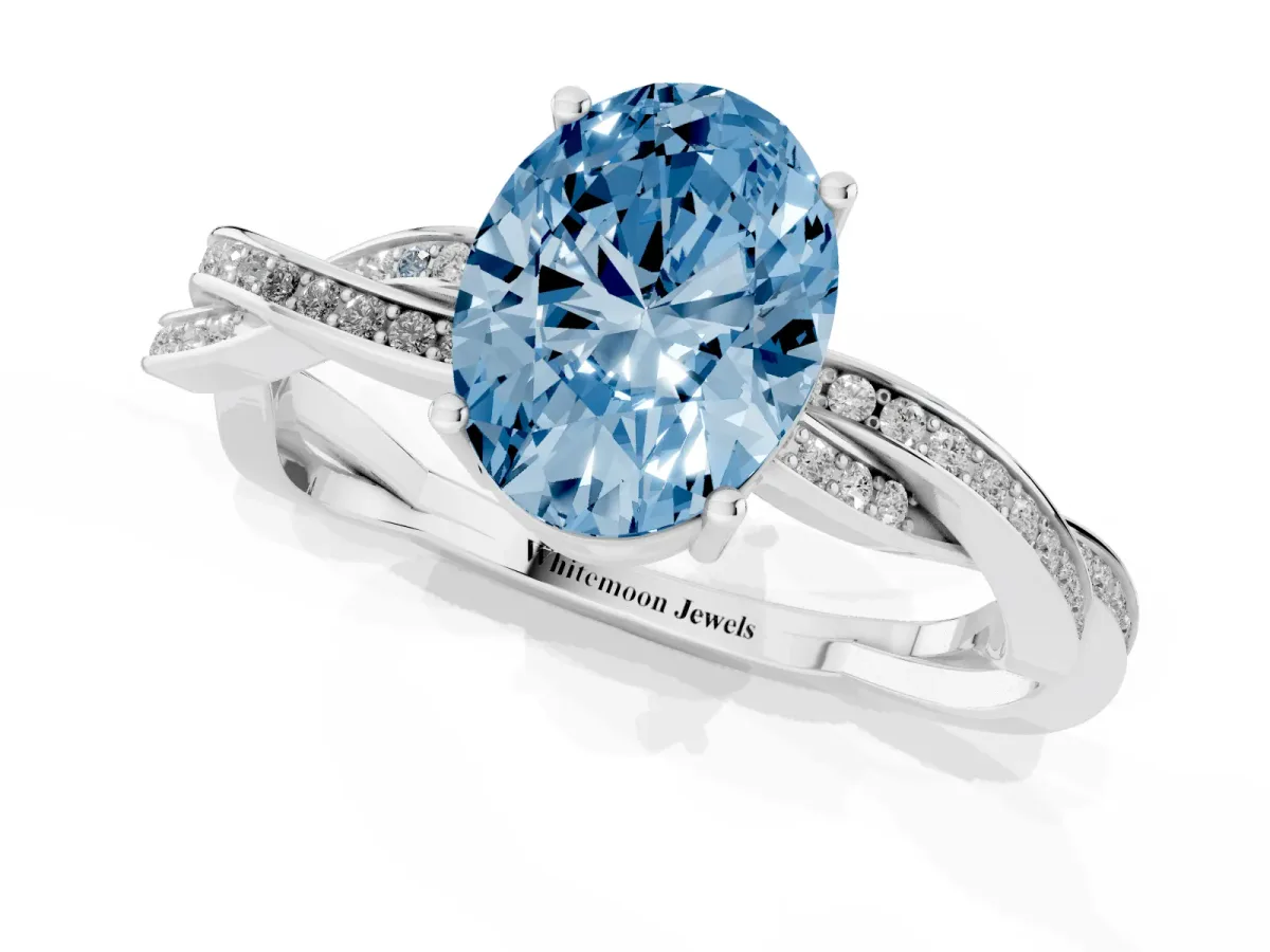 Fancy Blue Oval Cut Solitaire Twisted Pave Diamond Ring with Four-Prong Setting Platinum