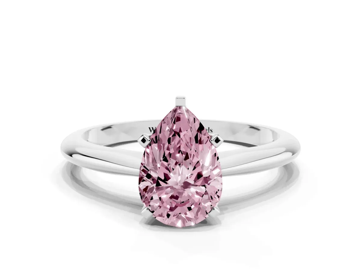Fancy Pink Pear Cut Cut Solitaire Ring with Four-Prong Setting on a Classic Band Platinum