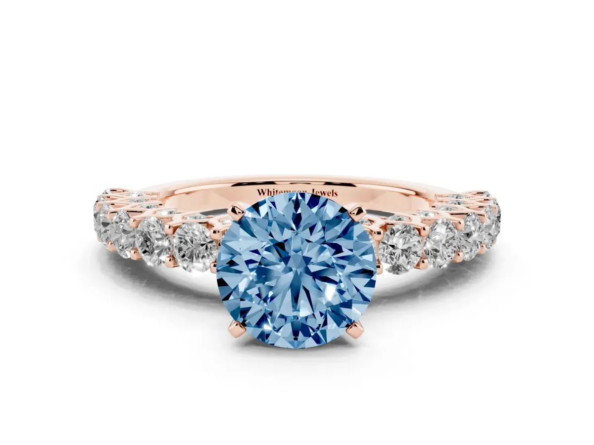Fancy Blue Round Cut Diamond Solitaire Ring with Shared Prong Pavé Band and Four-Prong Setting Rose gold