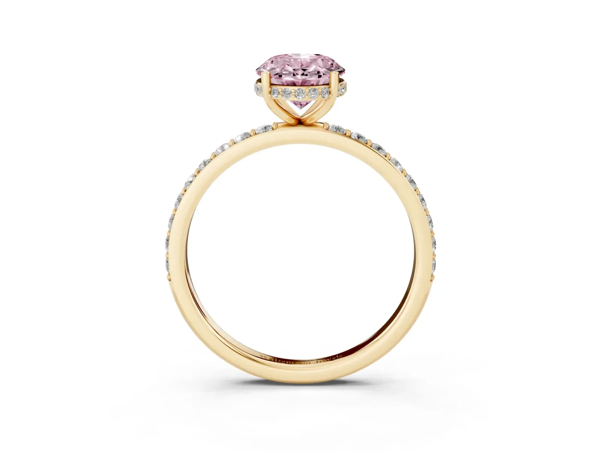 Fancy Pink Oval Cut Diamond Solitaire Ring with Pavé Band and Hidden Halo Yellow gold