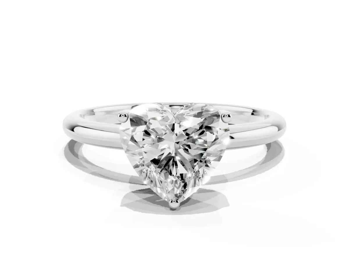 Heart Cut Cut Solitaire Engagement Ring with Four-Prong Setting and Classic Band Silver