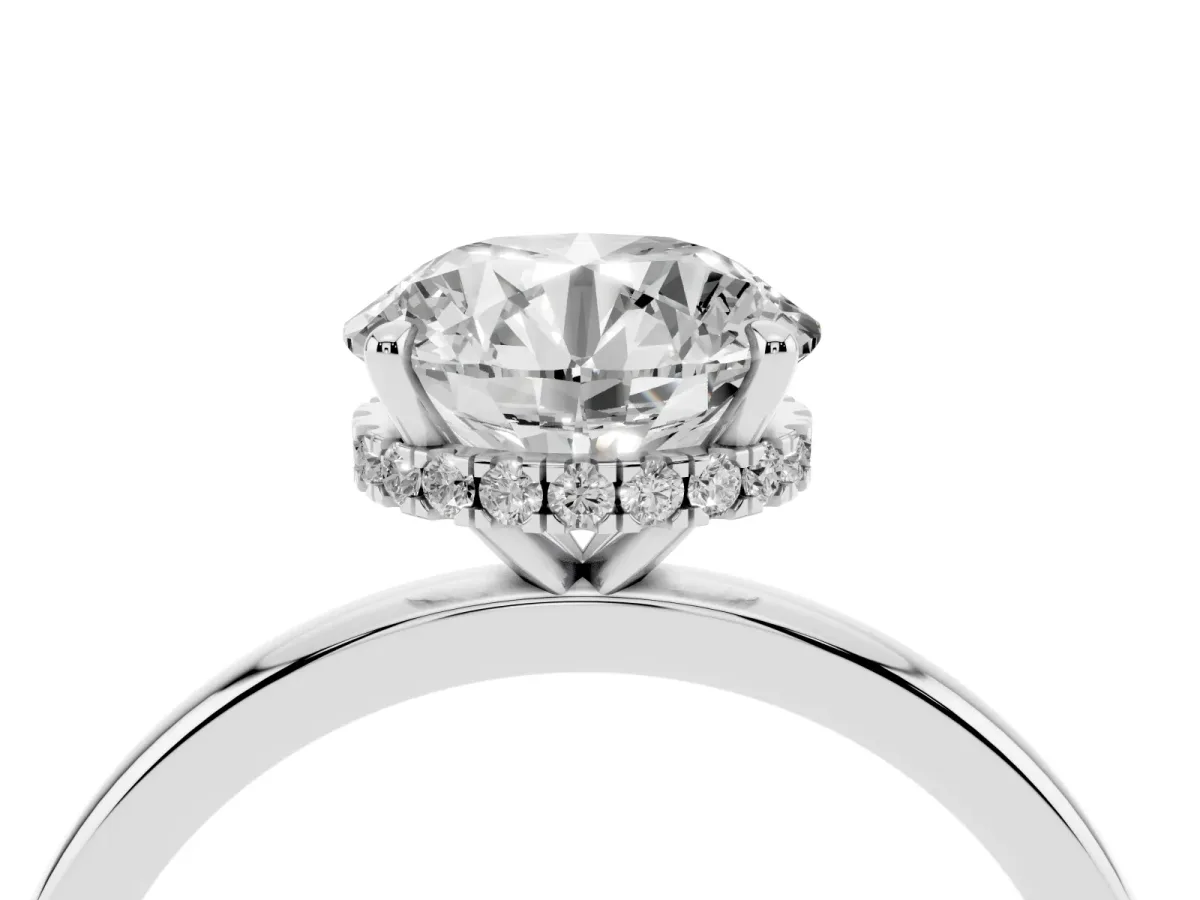 Round Cut Solitaire Engagement Ring with Cathedral Band and Four-Prong Setting Silver