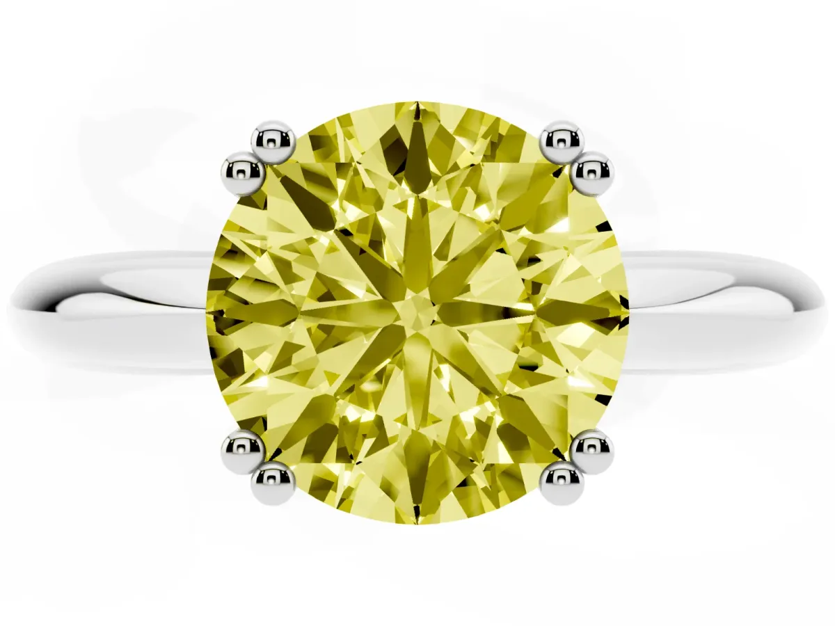 Fancy Yellow Round Cut Cut Solitaire Engagement Ring with Tapered Band and Four-Prong Setting Silver