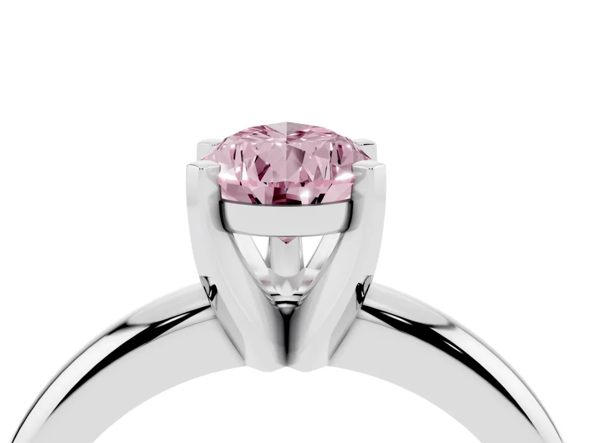 Fancy Pink Pear Cut Diamond Solitaire Engagement Ring with Round Band and Four-Prong Setting Platinum