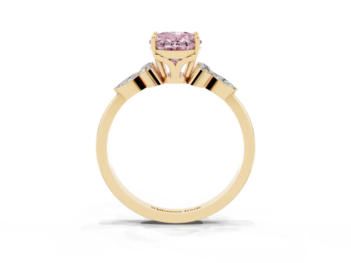 Fancy Pink Oval Cut Brilliant Diamond Solitaire Ring with Pear Side Stones and Four-Prong Setting Yellow gold