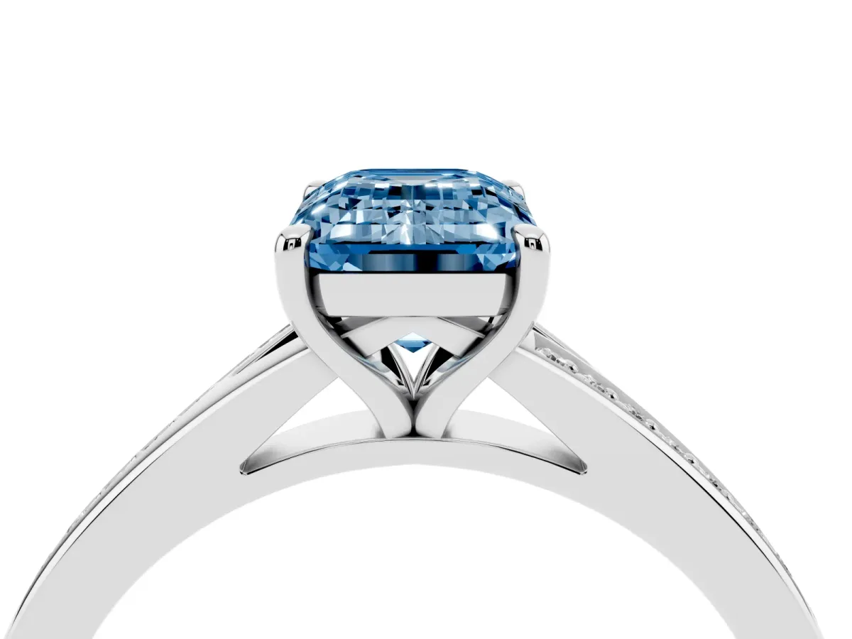 Fancy Blue Emerald Cut Diamond Solitaire Ring with Pavé Band and Prong Setting Platinum