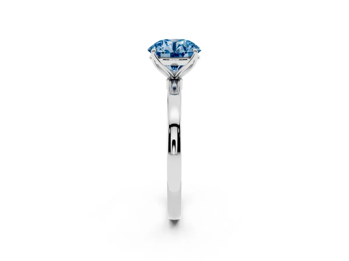Fancy Blue Round Cut Diamond Solitaire Ring with Thin Band and Prong Setting Silver