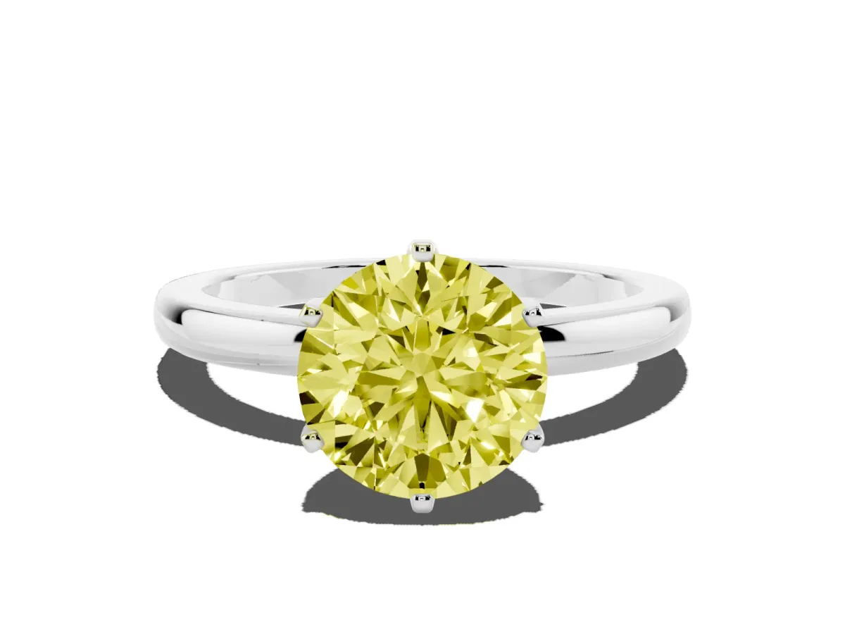 Fancy Yellow Round Cut Solitaire Diamond Ring with Six-Prong Setting on a Classic Band Silver