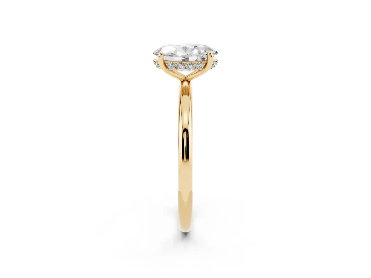 Oval Cut Solitaire Diamond Ring with a Classic Band and Four-Prong Setting Yellow gold