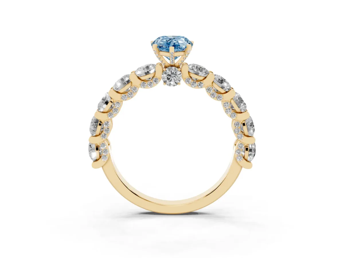 Fancy Blue Pear Cut Diamond Side Stone Engagement Ring with Four-Prong Setting Yellow gold