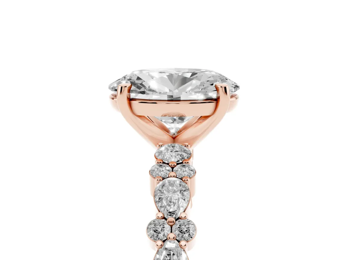 Oval Cut Diamond Side Stone Solitaire Ring with Round and Four-Prong Setting Rose gold
