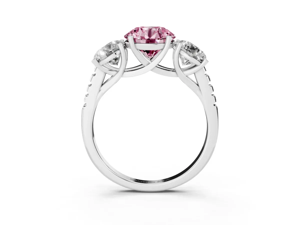Fancy Pink Three-Stone Round Cut Diamond Ring with Round Pavé Band and Prong Setting Silver