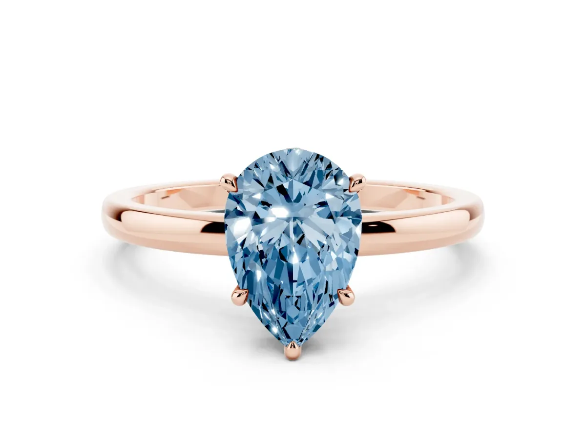 Fancy Blue Pear Cut Solitaire Engagement Ring with Cathedral Band and Four-Prong Setting Rose gold