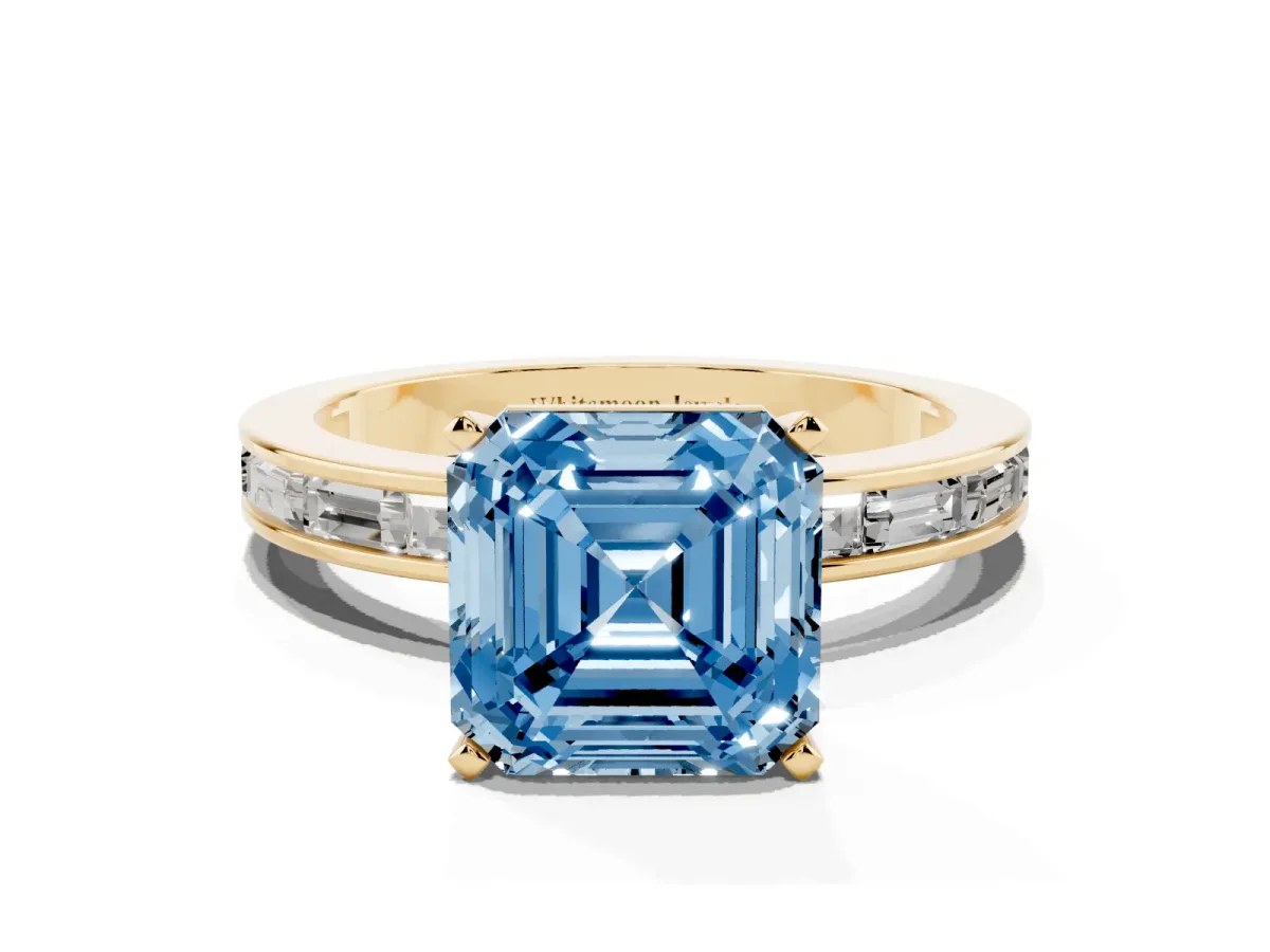 Fancy Blue Asscher Cut Solitaire Diamond Ring with Channel-Set Baguette Band and Four-Prong Setting Yellow gold