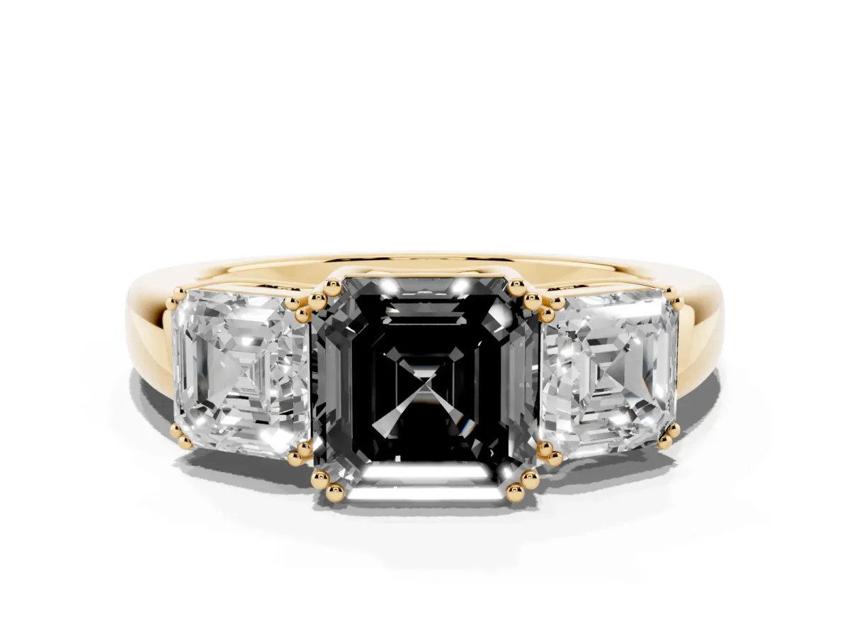 Fancy Black Three-Stone Asscher Cut Cut Diamond Ring with Channel Set Band and Four-Prong Setting Yellow gold