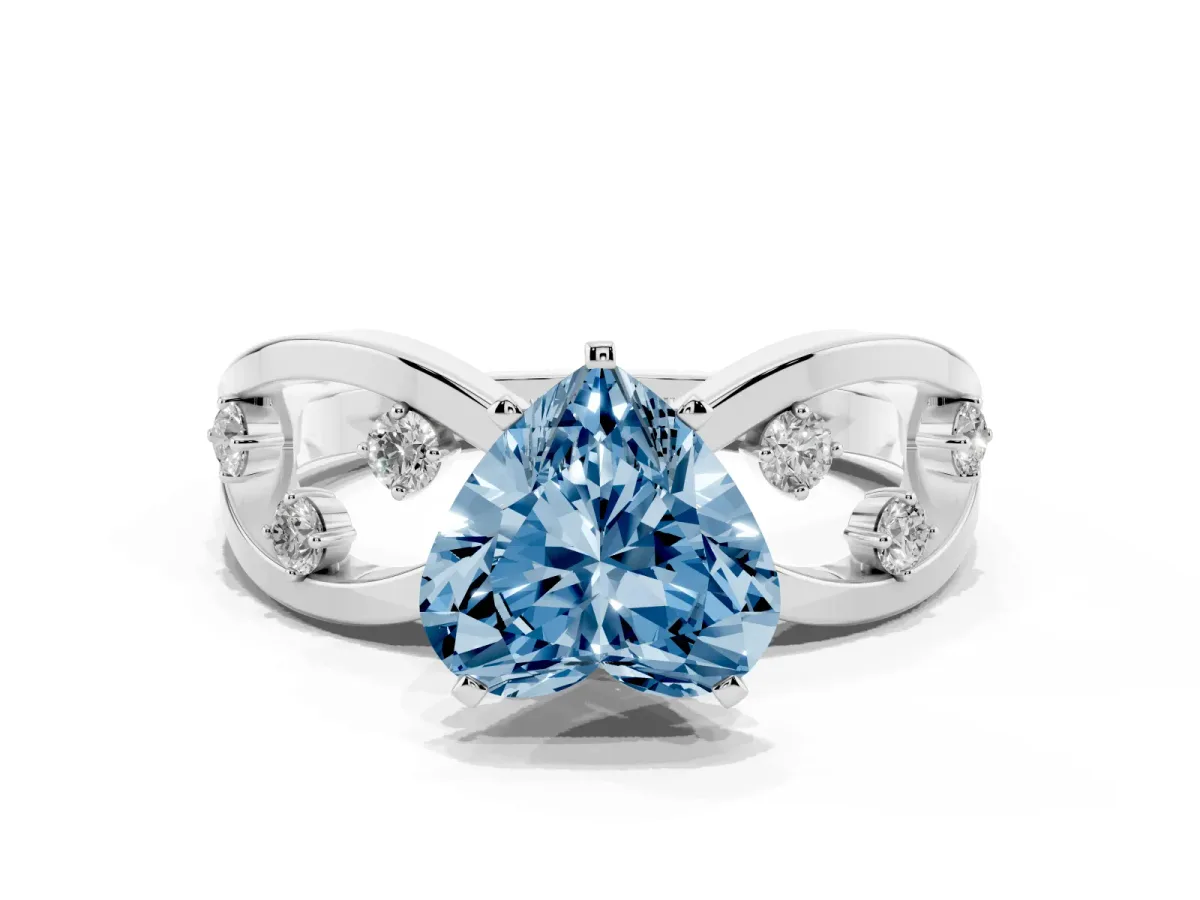 Fancy Blue Heart Cut Cut Solitaire Diamond with Side Stones on Criss-Cross Band and Four-Prong Setting Silver