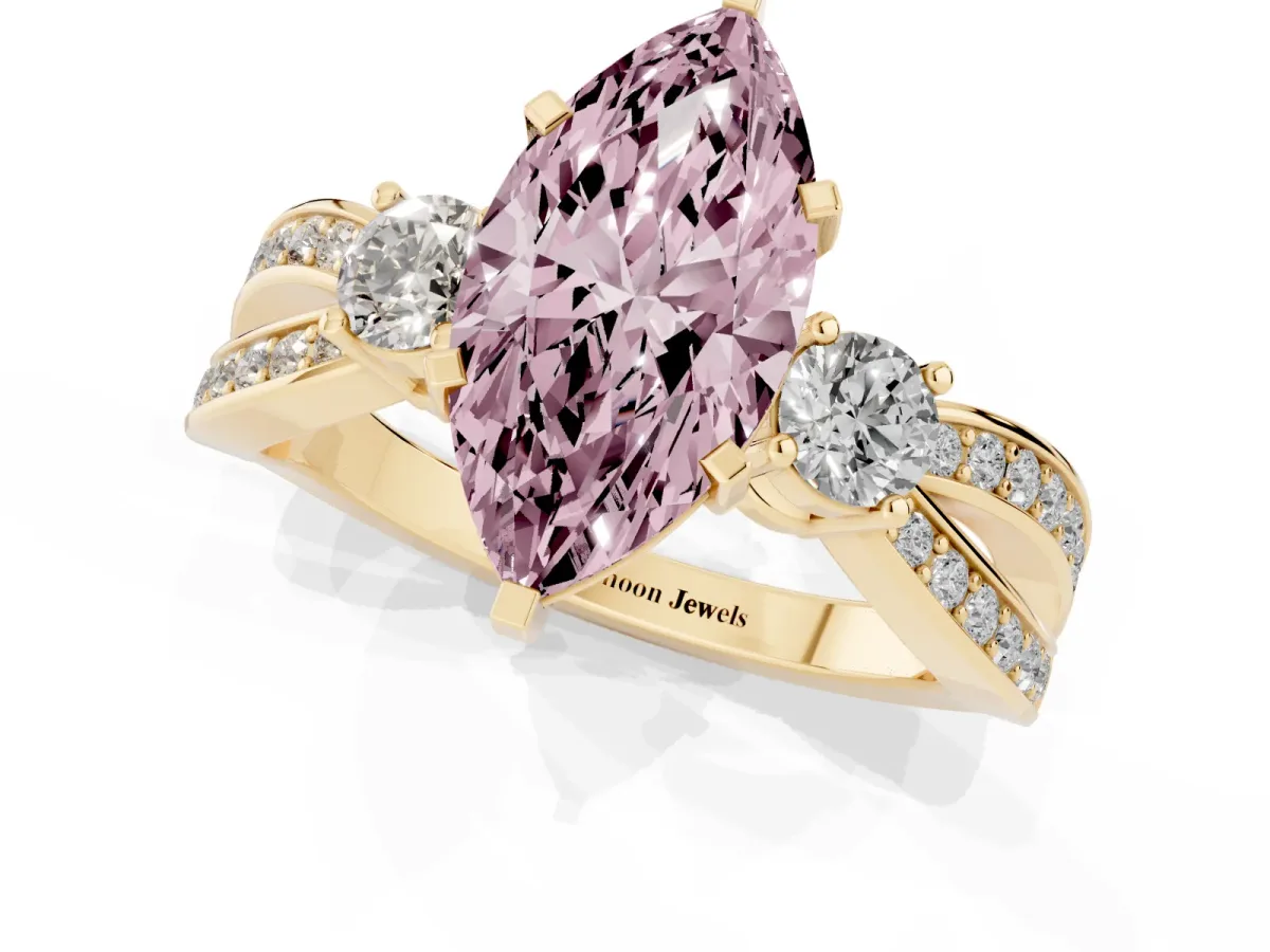 Fancy Pink Three-Stone Marquise Cut Cut Diamond Twist Band with Prong Setting Yellow gold